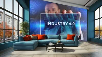 Business, Technology, Internet and network concept. Young businessman working on a virtual screen of the future and sees the inscription: Industry 4.0 Wall mural