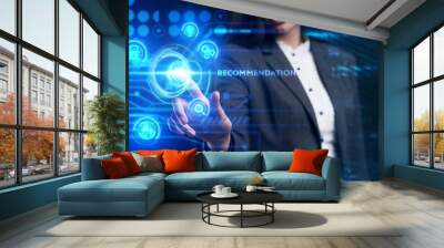 Business, Technology, Internet and network concept. Young businessman working on a virtual screen of the future and sees the inscription: Recommendation Wall mural