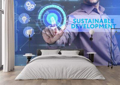 Business, Technology, Internet and network concept. Young businessman working on a virtual screen of the future and sees the inscription: Sustainable development Wall mural