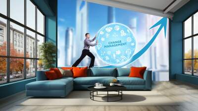 Technology, the Internet, business and network concept. A young businessman overcomes an obstacle to success: Change management Wall mural