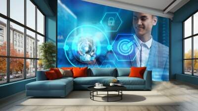 The concept of business, technology, the Internet and the network. A young entrepreneur working on a virtual screen of the future and sees the inscription: Wall mural