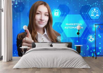 The concept of business, technology, the Internet and the network. A young entrepreneur working on a virtual screen of the future and sees the inscription: Marketing automation Wall mural