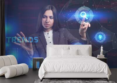 The concept of business, technology, the Internet and the network. A young entrepreneur working on a virtual screen of the future and sees the inscription: Trends Wall mural