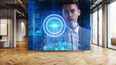 The concept of business, technology, the Internet and the network. A young entrepreneur working on a virtual screen of the future and sees the inscription: Trends Wall mural