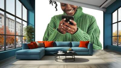 Happy Young Black Woman Texting on Smartphone, Wearing Green Sweater, Isolated on transparent background Wall mural