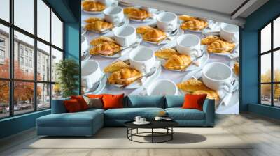 many dishes of croissant sandwich with coffee cup set up on white table for tea break time at business meeting conference refreshing up in afternoon Wall mural