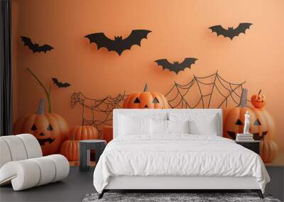 A Halloween display of pumpkins and bats Wall mural