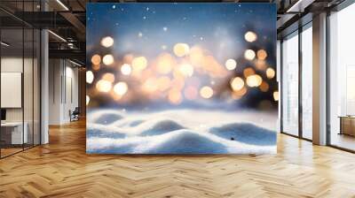 Christmas winter background with snow and blurred golden bokeh with copy text space Wall mural