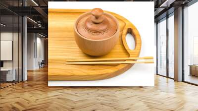 bamboo chopsticks lie on wooden utensils. items for food Wall mural