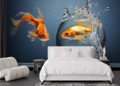 Goldfish jumping out of the water in a fishbowl. water world. fauna and biology. concept of achieving goal and freedom Wall mural