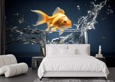 Goldfish jumping out of the water in a fishbowl. water world. fauna and biology. concept of achieving goal and freedom Wall mural