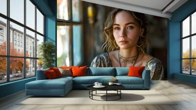 portrait of a beautiful young woman indoors near the window Wall mural