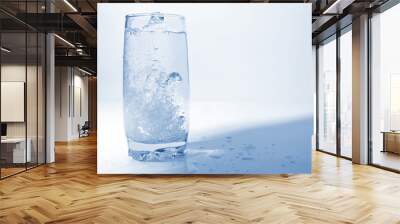 the water pouring in transparent glass with bubbles of air Wall mural