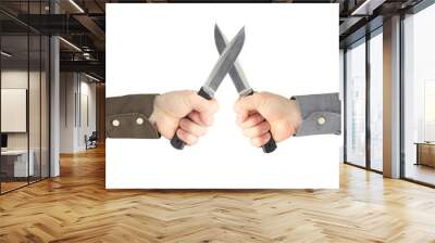 two hands with knives facing each other. Confrontation and war Wall mural