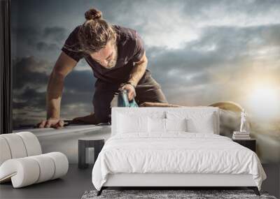 Young man working with a jigsaw Wall mural