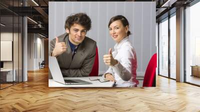 cheerful successful business team giving the thumbs up Wall mural