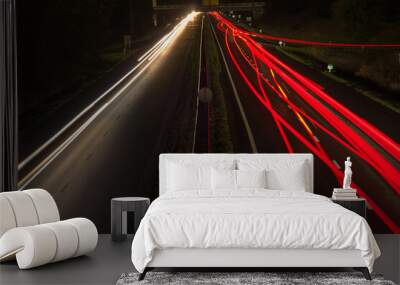 Highway at night with traffic blurred by motion in arnhem, Netherlands Wall mural