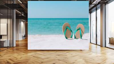 Ocean landscape And sandals on the beach. Welcome summer Wall mural