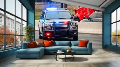 Road patrol police car on highway scene with emergency lights Wall mural