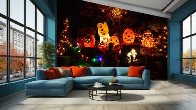 Scary halloween decorations outdoors at night close up Wall mural