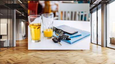 two glass of cool drinks on cafe table Wall mural