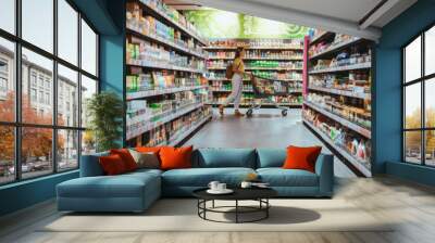 woman with shopping between store shelf Wall mural