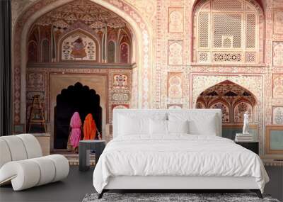 two women walking in the amber fort, jaipur Wall mural