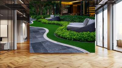 A luxurious hotel garden with well-maintained landscaping and comfortable seating Wall mural