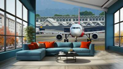 passenger airplane at langkawi airport Wall mural