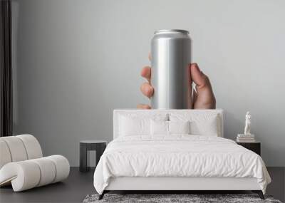 slim aluminium can in hand, pov view, white background  Wall mural