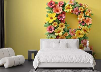 A flowery letter R is displayed on a yellow background Wall mural