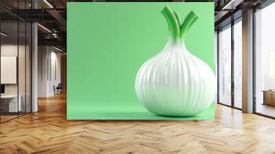 A pink onion is sitting on a pink background Wall mural