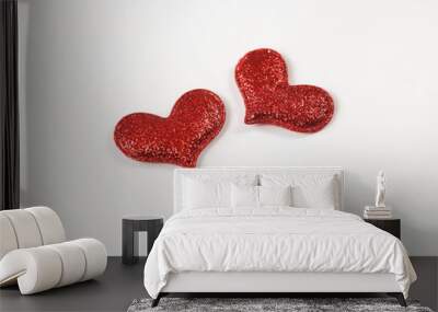 Close up of two red glitter hearts on white background Wall mural