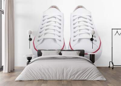 A pair of versatile white sneakers for everyday wear, isolated on white background Wall mural