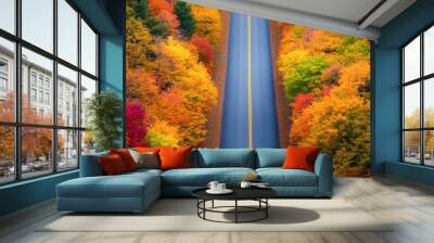 Autumn Road Through Vibrant Forest Wall mural