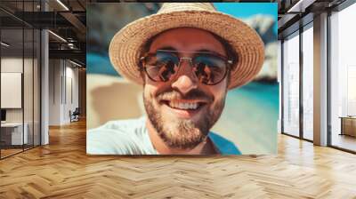 A happy guy is taking selfie on a summer vacation Wall mural