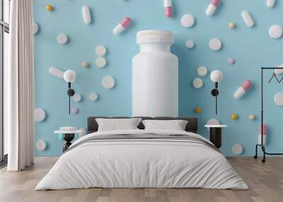 A medicine bottle with different pills, blue background Wall mural