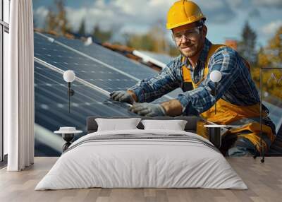 A solar power engineer installing the solar panels on the roof of a modern house Wall mural