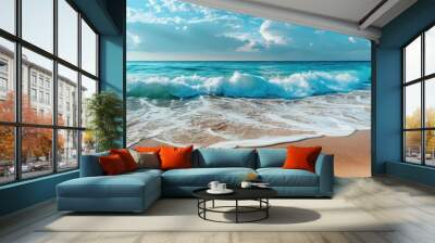 Calm beach landscape with golden sand, tranquil waves and a blue sky Wall mural