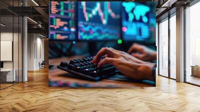 Hands at a keyboard background computer screens showing technical graphs and data Wall mural