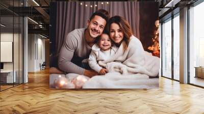 Mom, dad and a child posing at Christmas  in their cozy home. Generative AI Wall mural