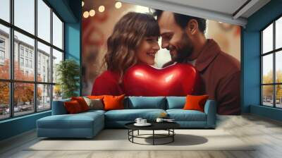 Romantic moment, couple with a big red heart in valentine photoshoot Wall mural