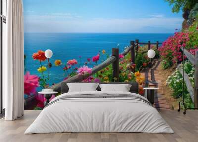 Seaside town in Spain with flowers, fences and ocean in the background Wall mural