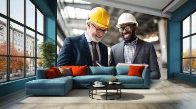 Two business partners in formal wear and with protective helmets on heads walking and talking about business. Generative AI Wall mural