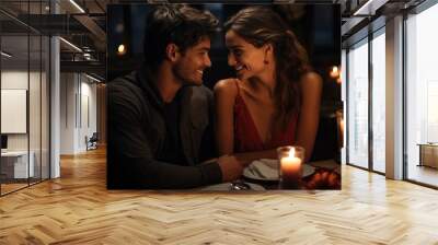 Young couple in love at a table in a restaurant Wall mural