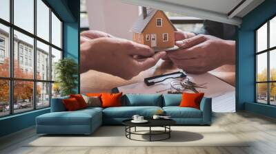 Car and House model with agent and customer discussing for contract to buy, get insurance or loan real estate or property background. Wall mural