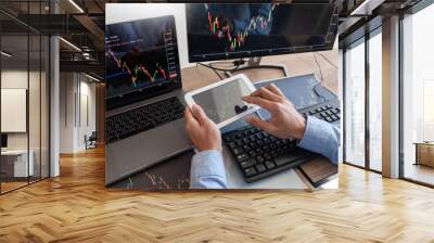 Working business man, team of broker or traders talking about forex on multiple computer screens of stock market invest trading financial graph charts data analysis. Wall mural