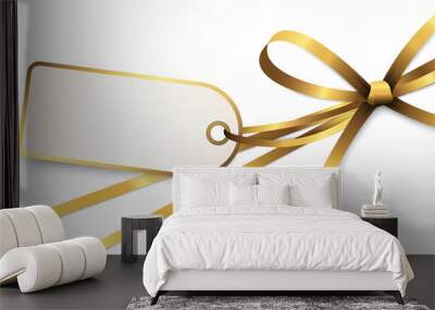 gold colored ribbon bow with hang tag Wall mural