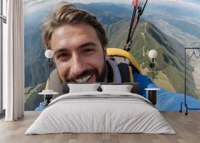 Parapente parachute sport extrême vol montagne homme barbu. Wall mural