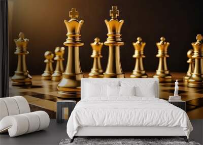 Two golden chess queens stand facing each other on a wooden chessboard, ready for battle. Wall mural